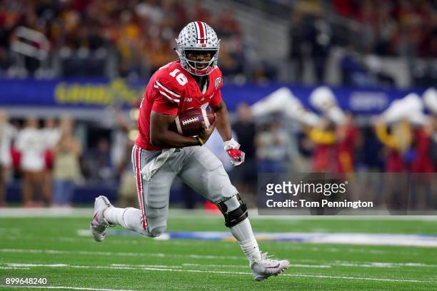 Barrett of the Ohio State Buckeyes scores a touchdown against the USC Trojans in the first half during the Goodyear Cotton Bowl Classic at AT&T...