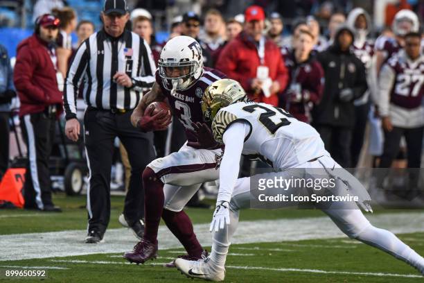 Texas A&M Aggies wide receiver Christian Kirk braces for a hit by Wake Forest Demon Deacons defensive back Ja'Sir Taylor during the Belk Bowl between...