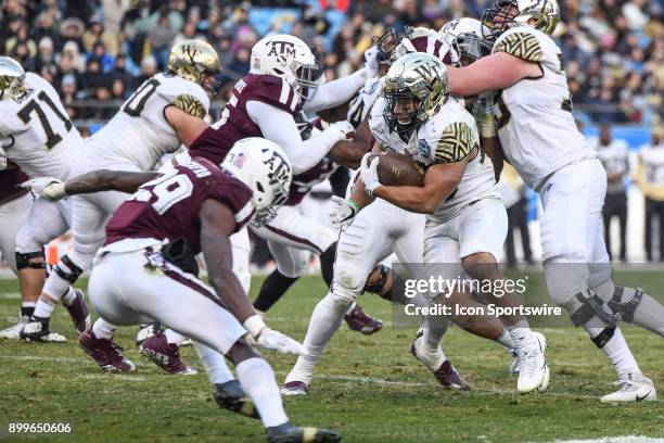 Wake Forest Demon Deacons running back Matt Colburn runs the ball during the Belk Bowl between the Wake Forest Demon Deacons and the Texas A&M Aggies...