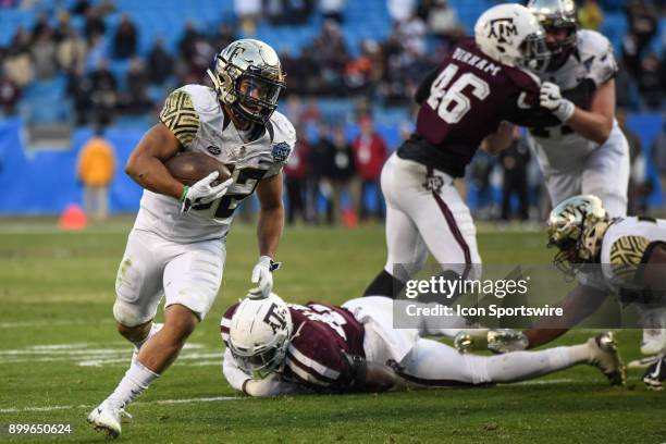 Wake Forest Demon Deacons running back Matt Colburn runs the ball during the Belk Bowl between the Wake Forest Demon Deacons and the Texas A&M Aggies...