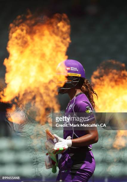 Hayley Matthews of the Hurricanes walks out to bat during the Women's Big Bash League match between the Hobart Hurricanes and the Sydney Thunder at...