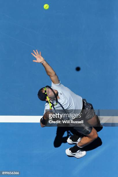 Jack Sock of the United States serves to Karen Khachanov of Russia in the mens singles match of the 2018 Hopman Cup at Perth Arena on December 30,...