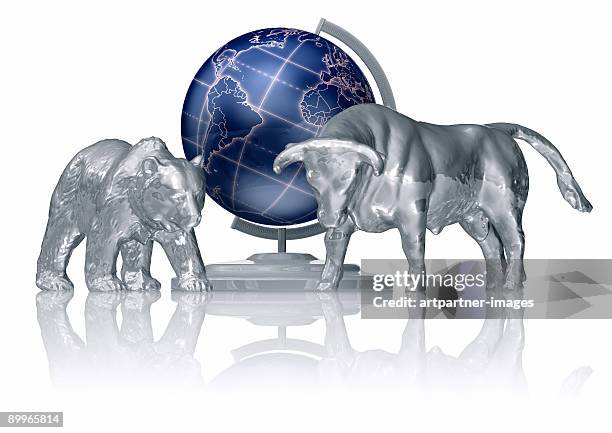 bull and bear in front of a globe - bull bear stock pictures, royalty-free photos & images