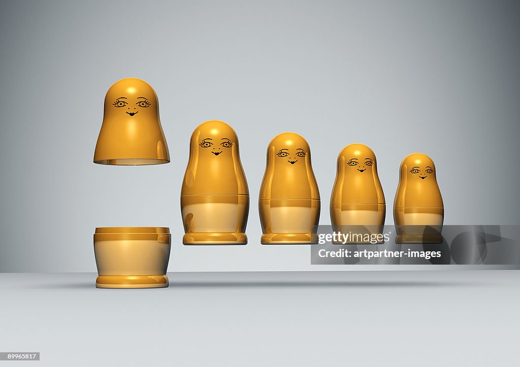 Row of golden Russian Dolls