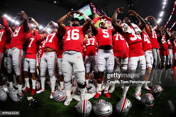 Barrett of the Ohio State Buckeyes celebrates with his team after the Ohio State Buckeyes beat the USC Trojans 24-7 during the Goodyear Cotton Bowl...