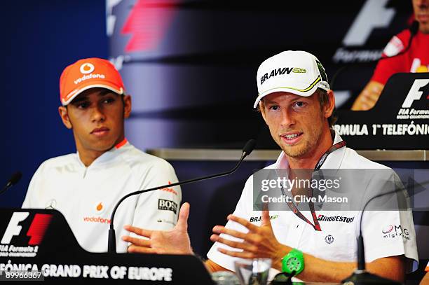 Lewis Hamilton of Great Britain and McLaren Mercedes and Jenson Button of Great Britain and Brawn GP attend the drivers press conference during...