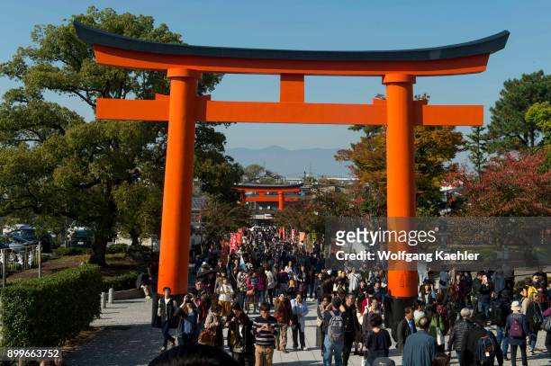 Tori gate at the entrance to the Fushimi Inari Taisha shrine, a Shinto shrine in Kyoto, Japan.