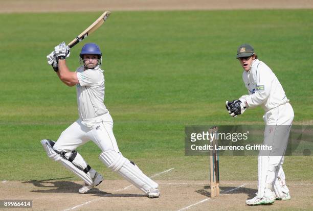 Michael Lumb of Hampshire hits out to the boundary during the LV County Championship Division One match between Nottinghamshire and Hampshire at...