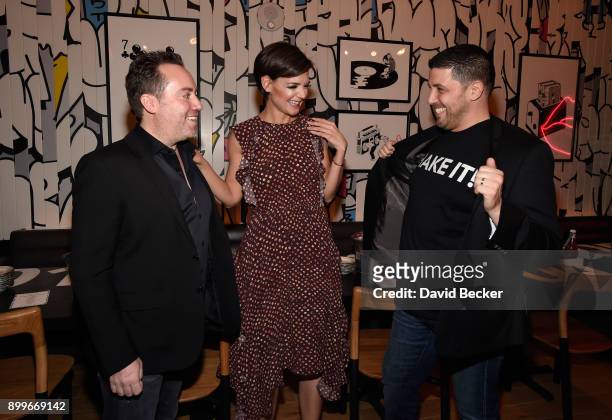 Co-owner Chris Barish, actress Katie Holmes and co-owner Joe Isidori attend the grand opening of Black Tap Craft Burgers & Beer at The Venetian Las...