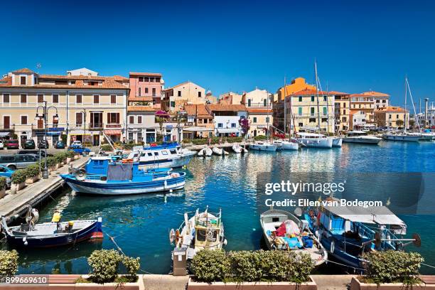 marina and view over la maddalena, the largest town in the maddalena archipelago at the costa smeraldo - sardegna foto e immagini stock