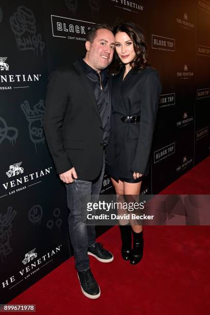 Co-owners Chris Barish and and his wife Julie Mulligan attend the grand opening of Black Tap Craft Burgers & Beer at The Venetian Las Vegas on...