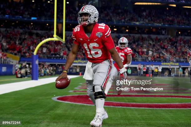 Barrett of the Ohio State Buckeyes celebrates after scoring a touchdown against the USC Trojans in the first half during the Goodyear Cotton Bowl...