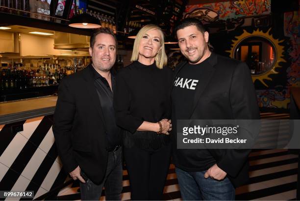 Co-owner Chris Barish, Lisa Long Adler and co-owner Joe Isidori attend the grand opening of Black Tap Craft Burgers & Beer at The Venetian Las Vegas...