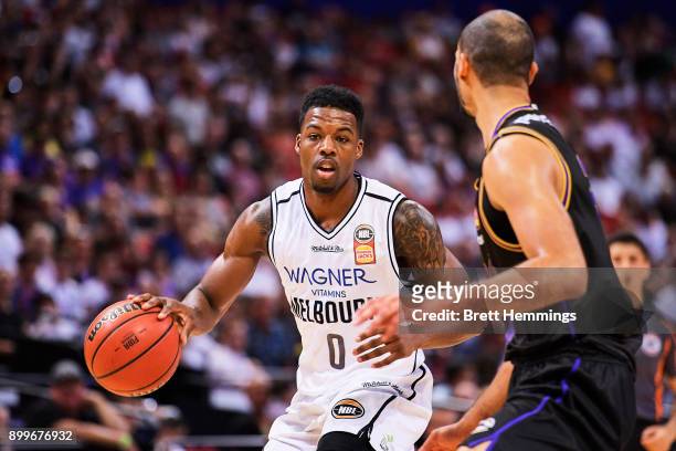 Carrick Felix of Melbourne controls the ball during the round 12 NBL match between the Sydney Kings and Melbourne United at Qudos Bank Arena on...