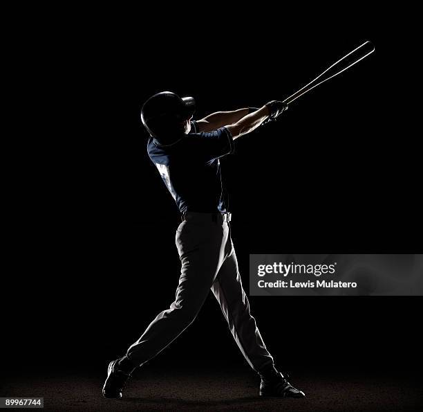 baseball player swinging bat - jogador de beisebol imagens e fotografias de stock