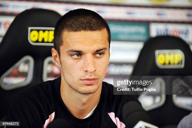 Palermo's new signing Cristian Melinte speaks to the media during a press conference at the Tenente Carmelo Onorato training centre on August 20,...