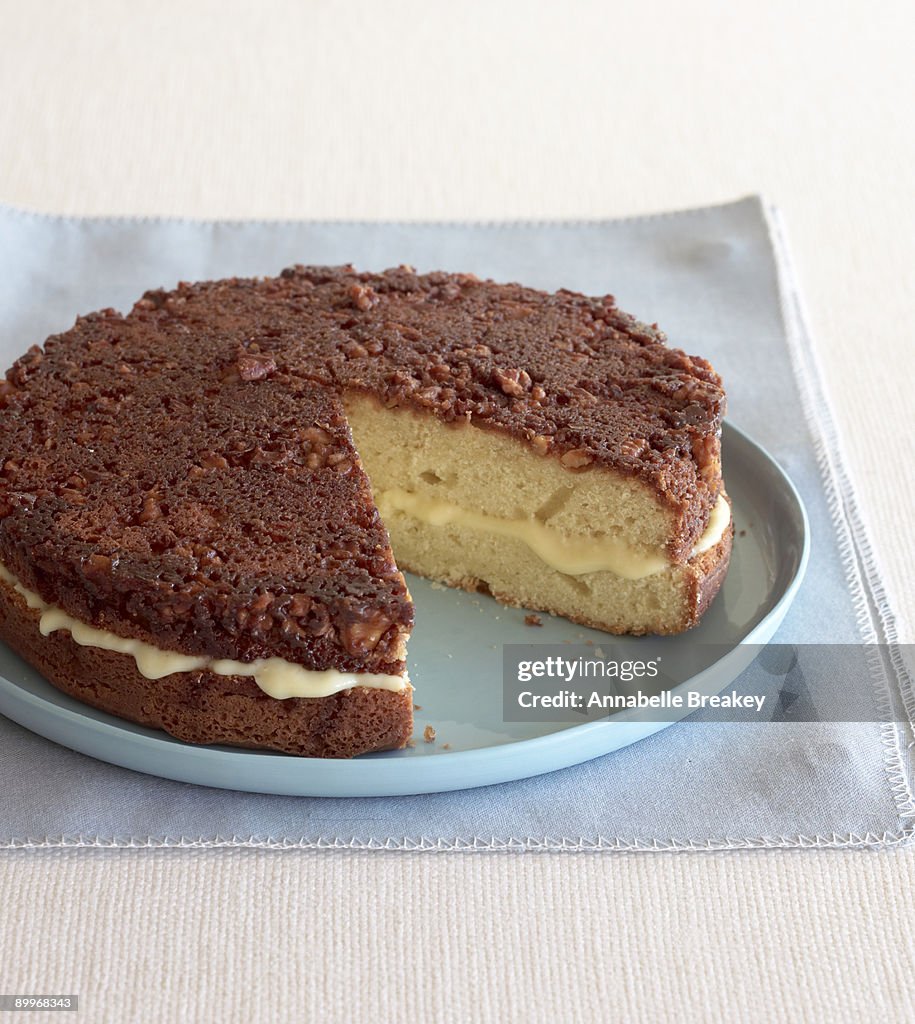 Custard filled walnut cake