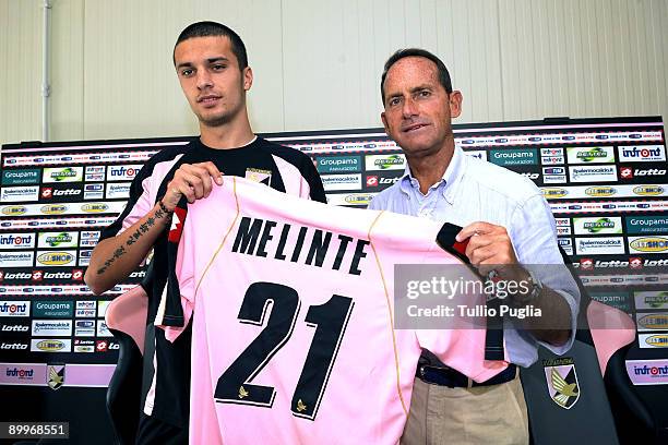 Palermo's new signing Cristian Melinte and vice-president Guglielmo Micciche pose with a shirt during a press conference at the Tenente Carmelo...