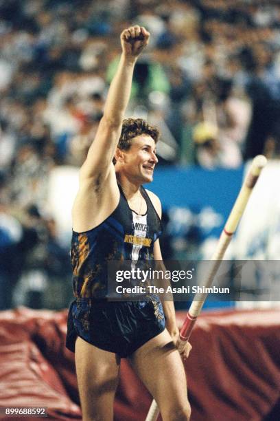 Sergey Bubka of Ukraine celebrates breaking the new world record in the Men's Pole Vault during the TOTO Super Track and Field at the National...