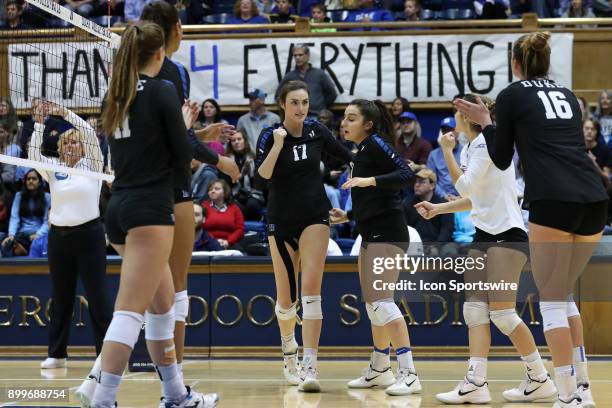 Duke's Samantha Amos celebrates a point with Emma Paradiso during the Duke Blue Devils game versus the North Carolina Tar Heels on November 24, 2017...