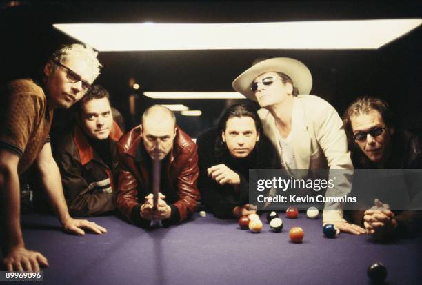 Australian rock group INXS, circa 1995. Left to right: drummer Jon Farriss, keyboard player Andrew Farriss, bassist Garry Gary Beers, singer Michael...