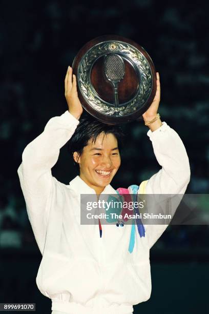 Kimiko Date celebrates with the trophy after winning the Women's Singles final against Mana Endo during day nine of the 67th All Japan Tennis...