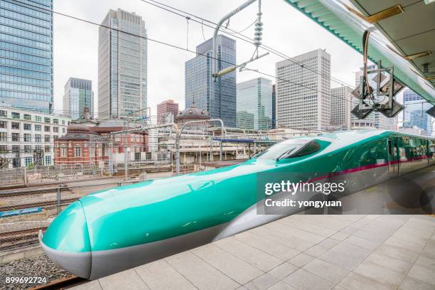 e5 series shinkansen at tokyo station - chuo ward tokyo stock pictures, royalty-free photos & images