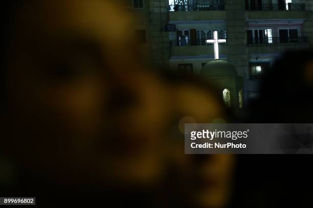 Egyptians gather at Mary Church during the funeral ceremony of the Mar Mina Church attacks victims in Helwan City, south of Cairo, Egypt on December...