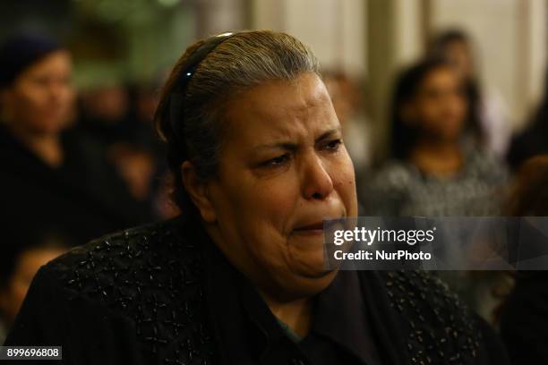 Woman cries during the funeral service of the victims of Egypt's Mar Mina church attack at a church in Helwan, South-eastern Cairo, Egypt, 29...