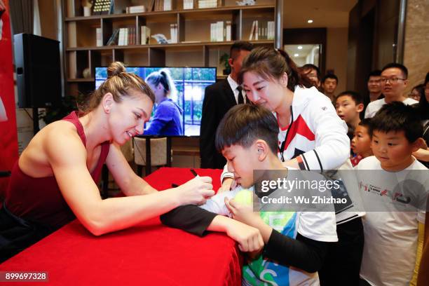 Simona Halep of Romania meets fans ahead of the 2018 WTA Shenzhen Open on December 30, 2017 in Shenzhen, China.