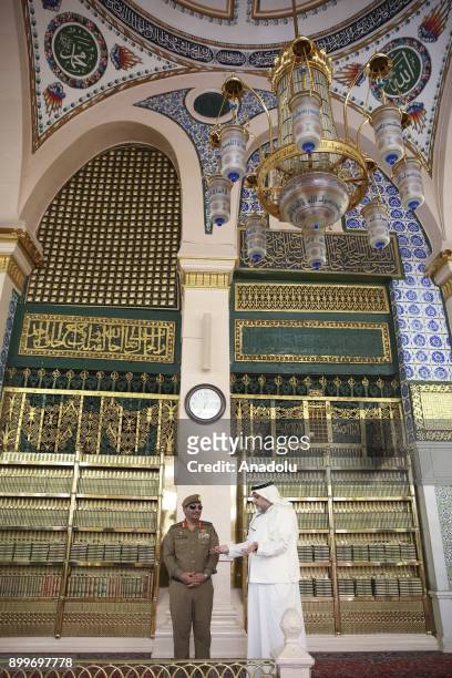 Muslims visit the Masjid al-Nabawi, established and originally built by the Holy Prophet Muhammad's, as they perform Umrah on December 30, 2017 in...