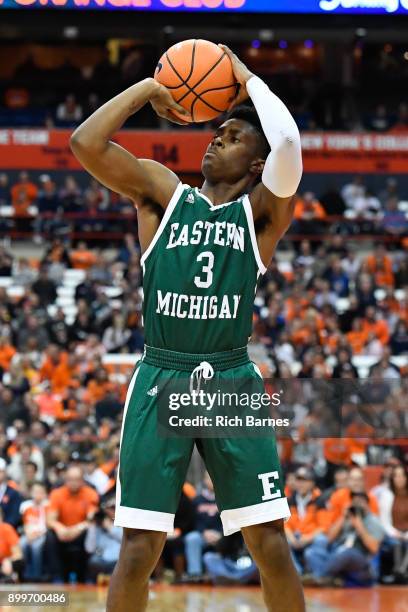 Paul Jackson of the Eastern Michigan Eagles shoots the ball against the Syracuse Orange during the first half at the Carrier Dome on December 27,...