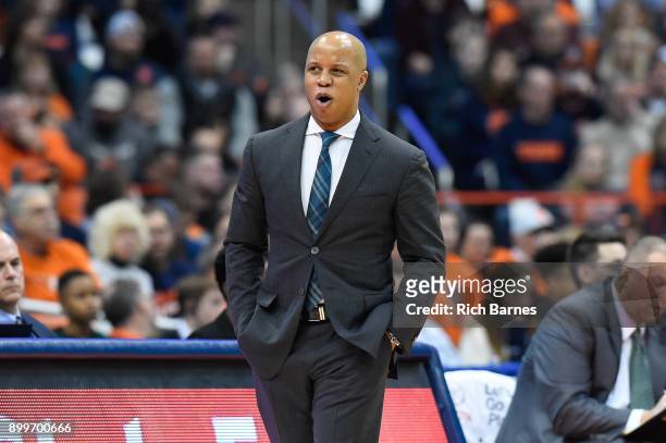 Head coach Rob Murphy of the Eastern Michigan Eagles reacts to a call against the Syracuse Orange during the first half at the Carrier Dome on...