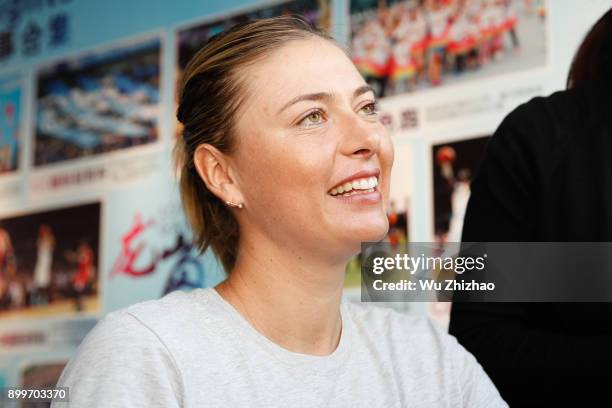 Maria Sharapova of Russia signs autographs for fans ahead of the 2018 WTA Shenzhen Open on December 30, 2017 in Shenzhen, China.