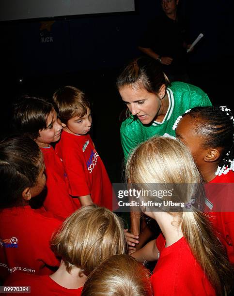 Soccer player Brandi Chastain teaches children about soccer and flu vaccinations at Super Soccer Stars Indoor Soccer Field on August 20, 2009 in New...