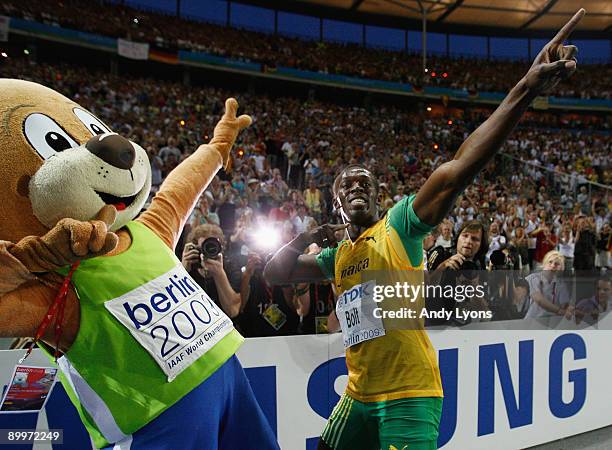 Usain Bolt of Jamaica celebrates winning the gold medal in the men's 200 Metres Final during day six of the 12th IAAF World Athletics Championships...