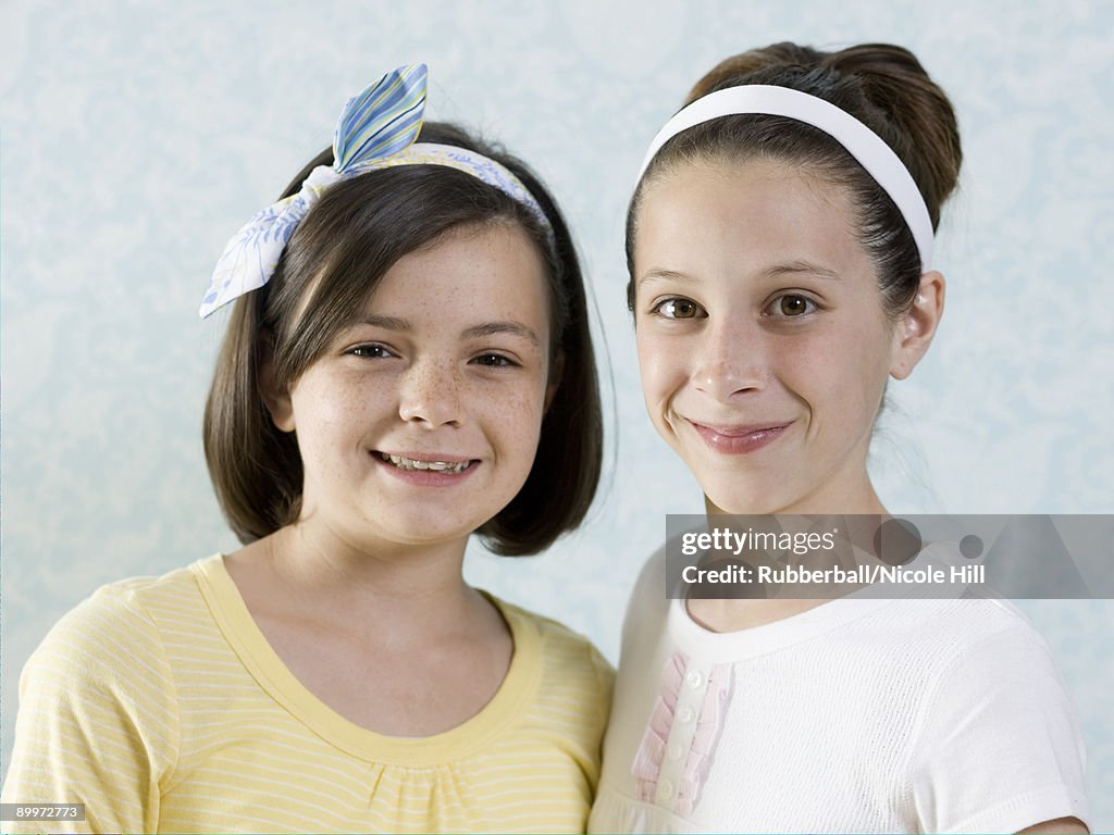 Two girls standing together