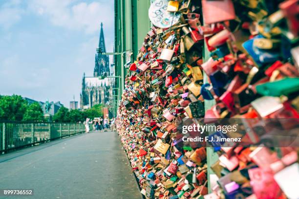 padlocks on the hohenzollern bridge in cologne - love padlocks stock pictures, royalty-free photos & images