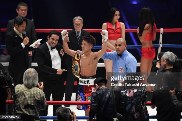Naoya Inoue of Japan celebrates after defeating Yoan Boyeaux of France in their WBO Super Flyweight Title Bout at the Yokohama Cultural Gymnasium on...