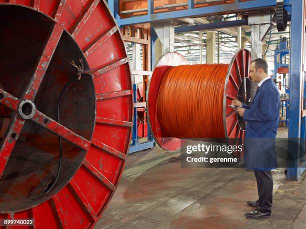 cable roll in factory - cable spool stock pictures, royalty-free photos & images