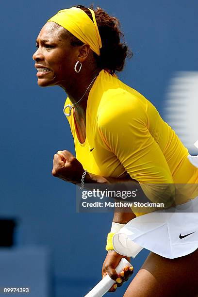 Serena Williams of the United States celebrates match point against Alona Bondarenko of the Ukraine during the Rogers Cup at the Rexall Center on...