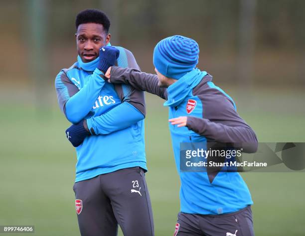 Arsenal's Danny Welbeck and Jack Wilshere mess around before a training session at London Colney on December 30, 2017 in St Albans, England.