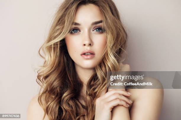 portrait of young beautiful woman with elegant make-up and perfect hairstyle - long blonde hair stock pictures, royalty-free photos & images