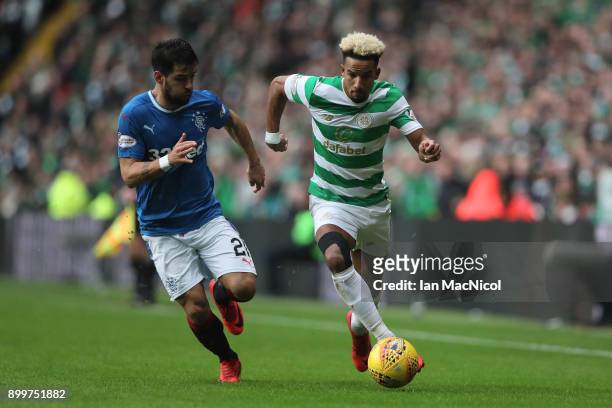 Scott Sinclair of Celtic is challenged by Daniel Joao Santos Candeias of Rangers during the Scottish Premier League match between Celtic and Rangers...