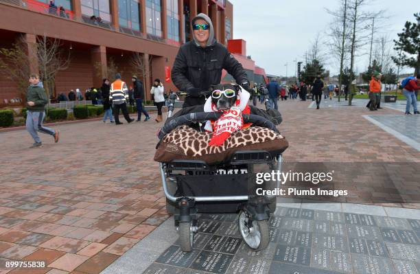 Liverpool fan with his dog at Anfield ahead of the Premier League match between Liverpool and Leicester City at Anfield, on December 30th, 2017 in...