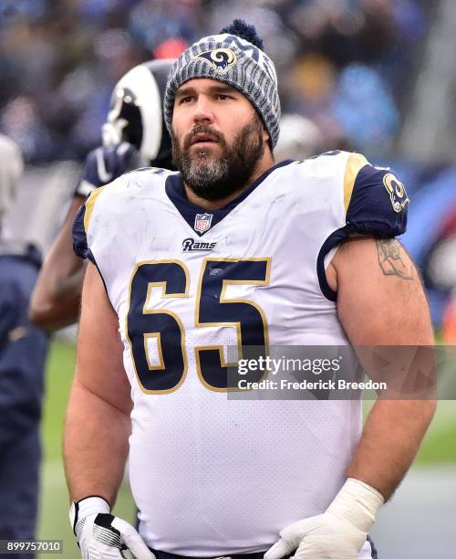 John Sullivan of the Los Angeles Rams watches from the sideline during a game against the Tennessee Titans at Nissan Stadium on December 24, 2017 in...