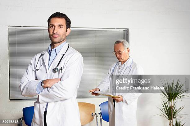 doctors in waiting room - doctor attitude stock pictures, royalty-free photos & images