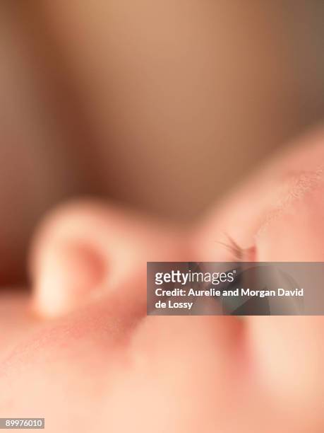 baby looking up - extreme close up baby stock pictures, royalty-free photos & images
