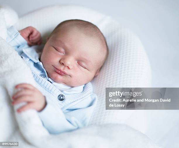 baby sleeping - david de lossy sleep stock pictures, royalty-free photos & images