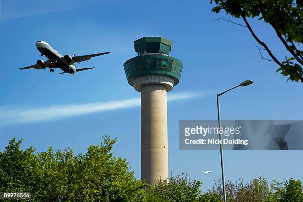 plane ascending after take off - stansted airport stock pictures, royalty-free photos & images